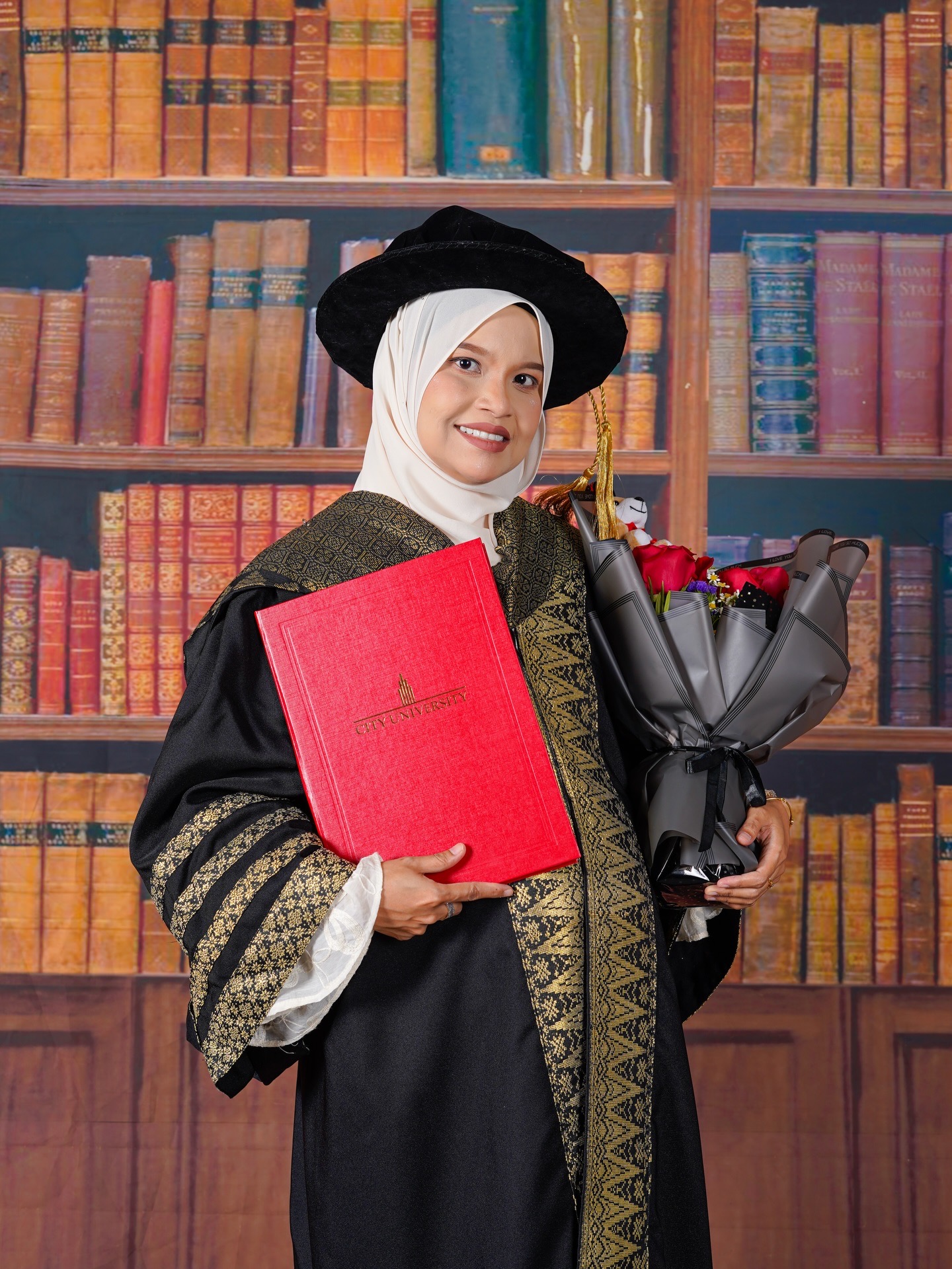 AYP Film convocation portrait with degree and bouquet